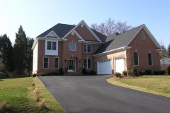 Brick Colonial with Three Car Garage